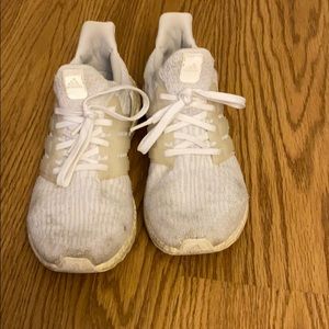 White ultra boost worn